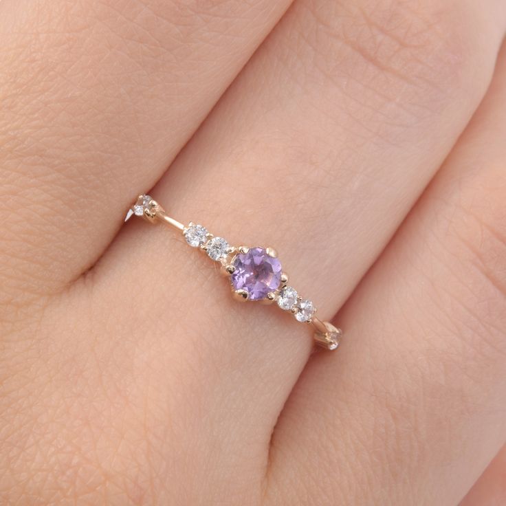 14k solid rose gold dainty & elegant amethyst promise ring for her, Unique small womens amethyst engagement ring, February birthstone WE OFFER UNLIMITED PERIOD INSTALLMENTS PLAN This is a beautiful, stunning, feminine ring that works well for all occasions, styles, and ages. You will love it! Ring information: Main stone: Amethyst Approximate size: 4.0mm Accent stones: Cubic zirconia Approximate size: 1.75mm (6 stones) Metal type: Gold Metal stamp: 14k Gold Installment Payments We offer inst Cute Dainty Promise Rings, Promise Rings Amethyst, Dainty Promise Rings Simple, Amethyst Promise Ring, Unique Promise Rings For Her, Purple Engagement Ring, Amethyst Wedding Ring, Cute Promise Rings, Birthstone Promise Rings