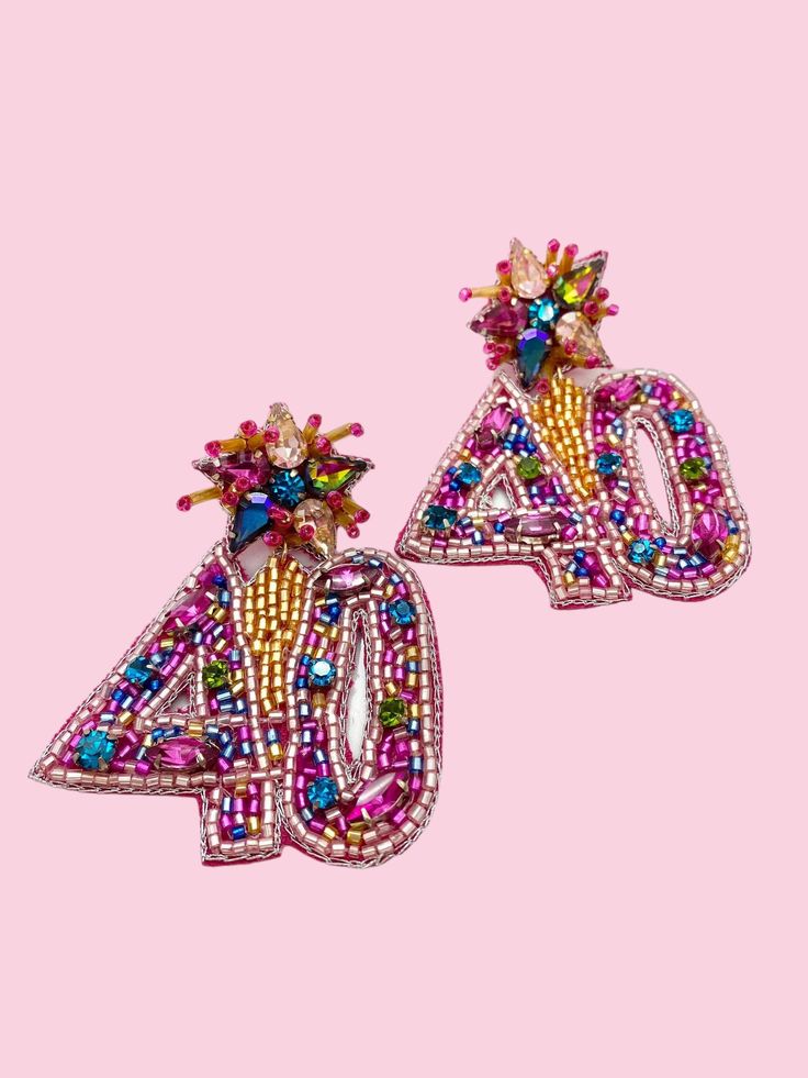 Celebrate turning 40 with style and a bit of flair with these cute number earrings. Perfect for you or someone special (or just as a fun gift for someone else), these lightweight earrings are made with nickel-free, surgical steel and felt backs, so you can wear them comfortably all day long. Nickel-free Pink Earrings For Birthday, Fun Silver Earrings For Birthday, Nickel-free Multicolor Earrings For Birthday, Trendy Birthday Earrings For Pierced Ears, Trendy Silver Earrings For Birthday, Trendy Personalized Earrings For Birthday, Nickel-free Earrings For Birthday, Multicolor Drop Earrings For Birthday, Birthday Drop Earrings