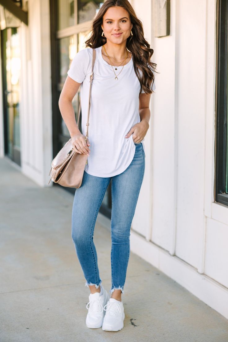 For all your meetups with friends, Saturday strolls, and lazy Sundays, this will be your go to top! This classic t-shirt is a versatile piece that can be worn with jeans, skirts, joggers, and more. Round neckline Short sleeves Curved hemline Generous stretch Sydney is wearing the small. Casual T-shirt With Shirttail Hem For Day Out, Trendy T-shirt With Shirttail Hem For Day Out, Versatile T-shirt For Spring Casual Gatherings, Versatile Crew Neck T-shirt For Day Out, White Peplum, Mint Julep Boutique, Lazy Sunday, Mint Julep, Tee Outfit