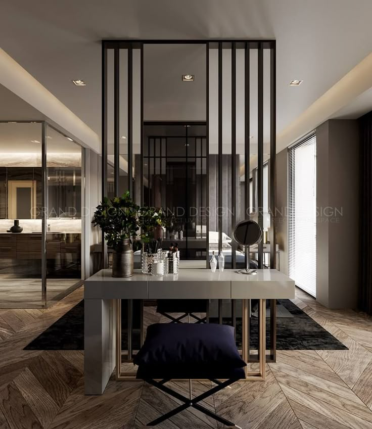 an elegant dining room with wood flooring and glass partitions on the wall, along with a large white table surrounded by potted plants