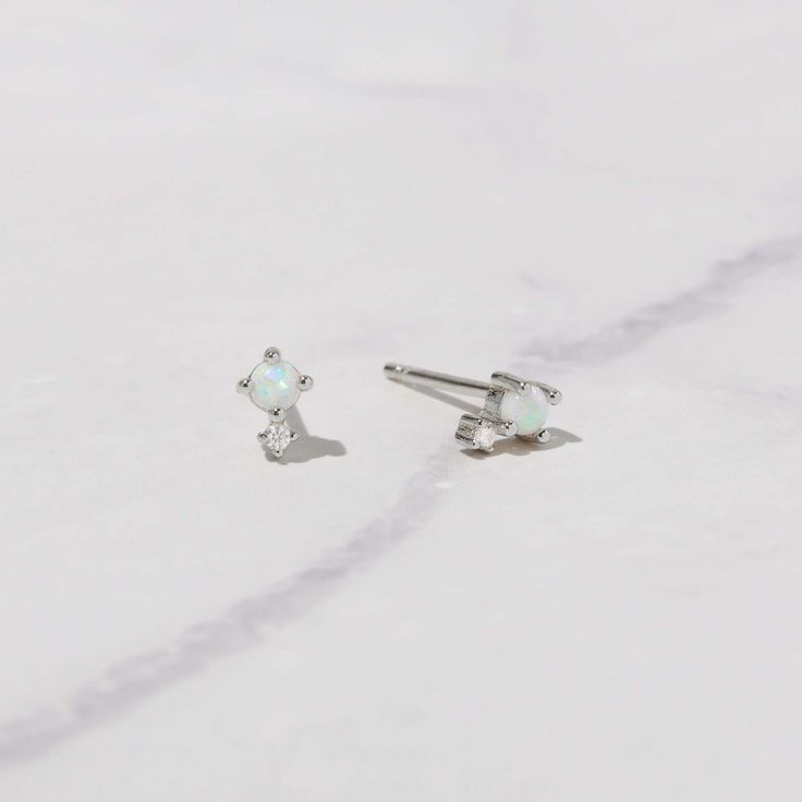 These opal studs are super cute and dainty! They are small, so are perfect for a minimalist look, for 2nd + piercings, or even for kids! Made of 925 Sterling Silver Sold as a Pair Measures 5 mm Push Back Closure Hypoallergenic and nickel free Made of lab created opal, and highest grade cz stone Opal Stud Earrings, Earrings Opal, Opal Earrings Stud, Opal Studs, Opal Earrings, Dainty Earrings, October Birth Stone, Opal Jewelry, Cz Stone