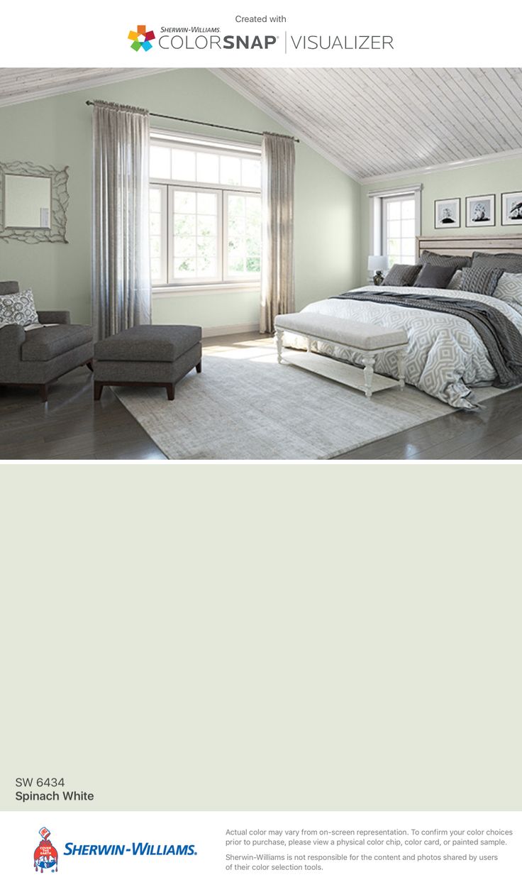 an image of a bedroom with blue walls and white carpeted flooring in the room