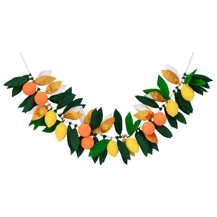 an orange and lemon garland on a white background with green leaves in the shape of fruit