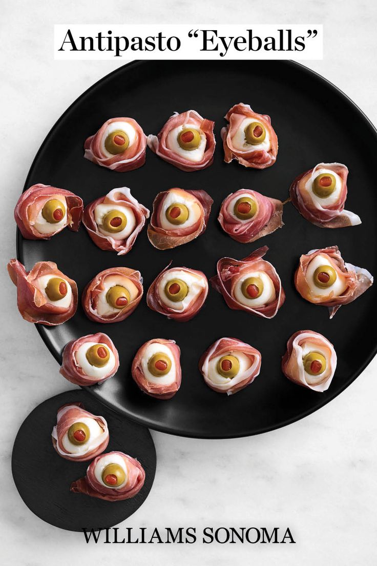 an image of food on a plate with the title antipasto eyeballs?