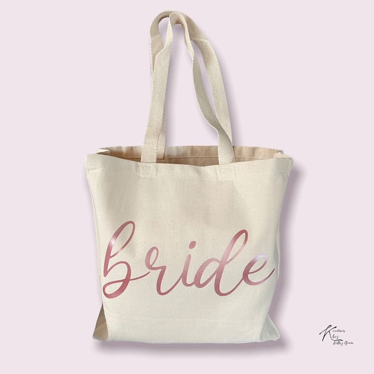 14L 12 oz./yd², 100% heavy cotton canvas 20 1/2" web canvas handles 9" handle drop CUSTOM TEXT IS AVAILABLE! If you would like a name instead, please choose your bag color and then "CUSTOM" text color. Once your order has been completed, please email me at kreationsbykellyanne@gmail.com with your custom text request. Be sure to include your order number. Customizable Cotton Canvas Bag For Everyday Use, Large Canvas Bag Perfect For Gifts, Customizable White Canvas Bag, Bride Tote Bag, Fall Humor, Bride Tote, Pom Pom Girl, Photo Ornaments, Holiday Themes