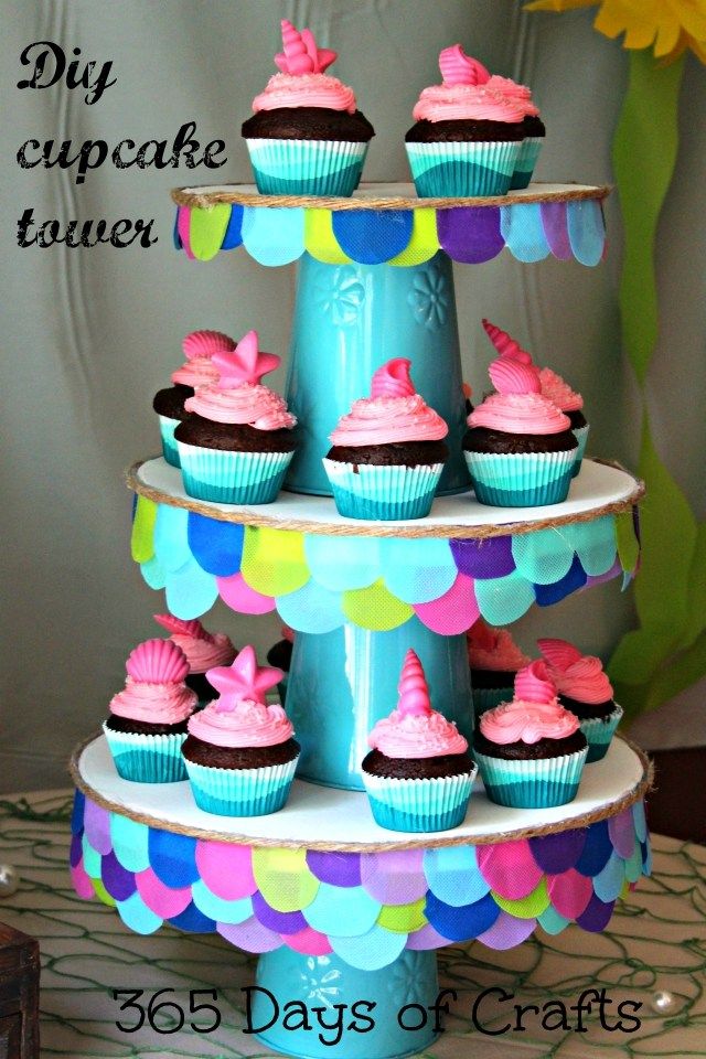 a three tiered cake stand with cupcakes on it and the words, diy cupcake tower 350 days of crafts