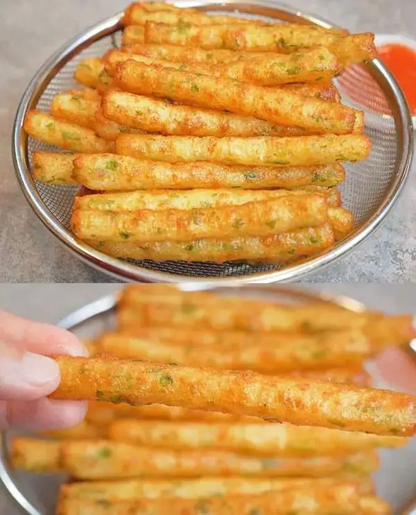 some food is being cooked in a strainer and then placed on a plate to be eaten