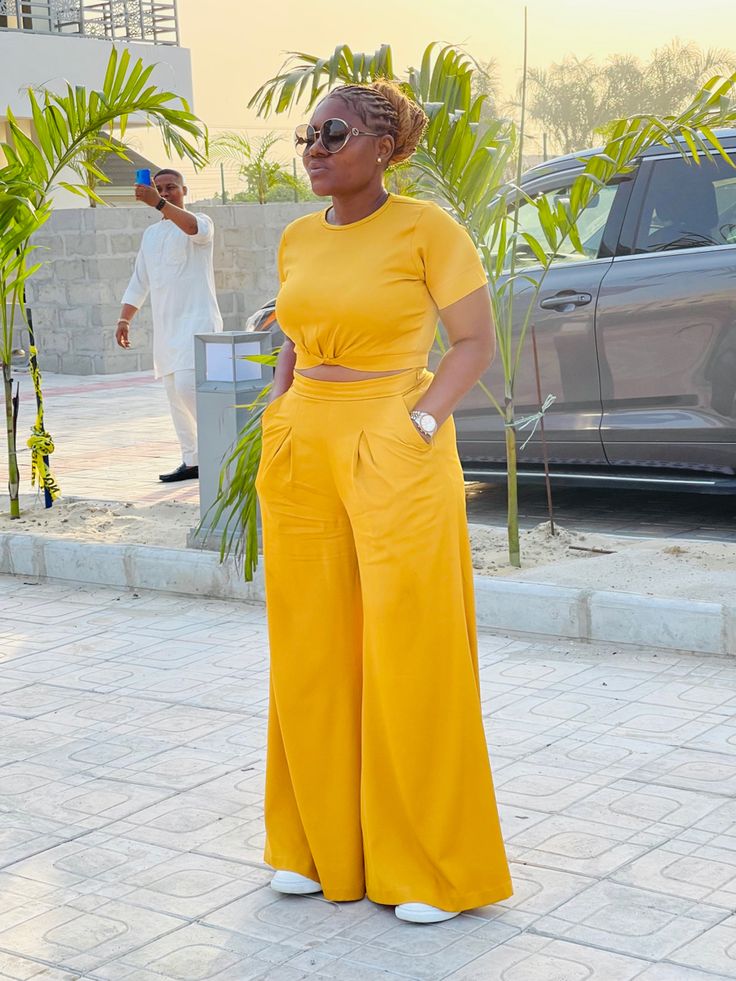 Crop top and a palazzo pants Crop Top Two Piece Outfits, Palazzo Pant With Crop Top, Crop Top With High Waisted Pants, Pallazo And Crop Top Outfit, Trouser Top Outfit, Chiffon Two Piece Set Pants, Pallazo Trouser With Top, Ankara Crop Top And Palazzo Pants, Pallazo Trouser Styles