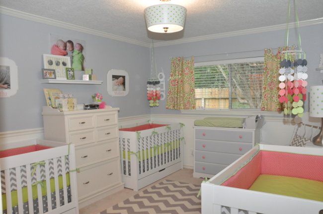 a baby's room with two cribs, dressers and other furniture