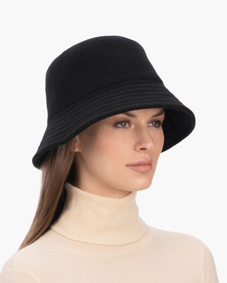 A cozy, lightweight women's bucket hat of spun wool with trapunto stitched brim rolls up easily into a coat pocket or a tote bag. Eric says, "It's definitely a bucket hat season where the attitude is a bit more casual than a fedora." What makes this women's bucket hat most desirable is that the crown is spun and then blocked to achieve the shape; The crown has no visible seams so it doesn't feel thick, while providing great insulation and protection from the elements. Brim span: 2.75"(7cm) Fully Chic Everyday Felt Hat For Winter, Wool Bucket Hat With Curved Brim For Fall, Everyday Brimmed Felt Hat For Winter, Casual Wool Bucket Hat, Casual Wool Bucket Hat With Curved Brim, Casual Wool Brimmed Cloche Hat, Casual Wool Cloche Hat With Short Brim, Casual Wool Cloche Hat For Winter, Classic Winter Bucket Hat With Short Brim