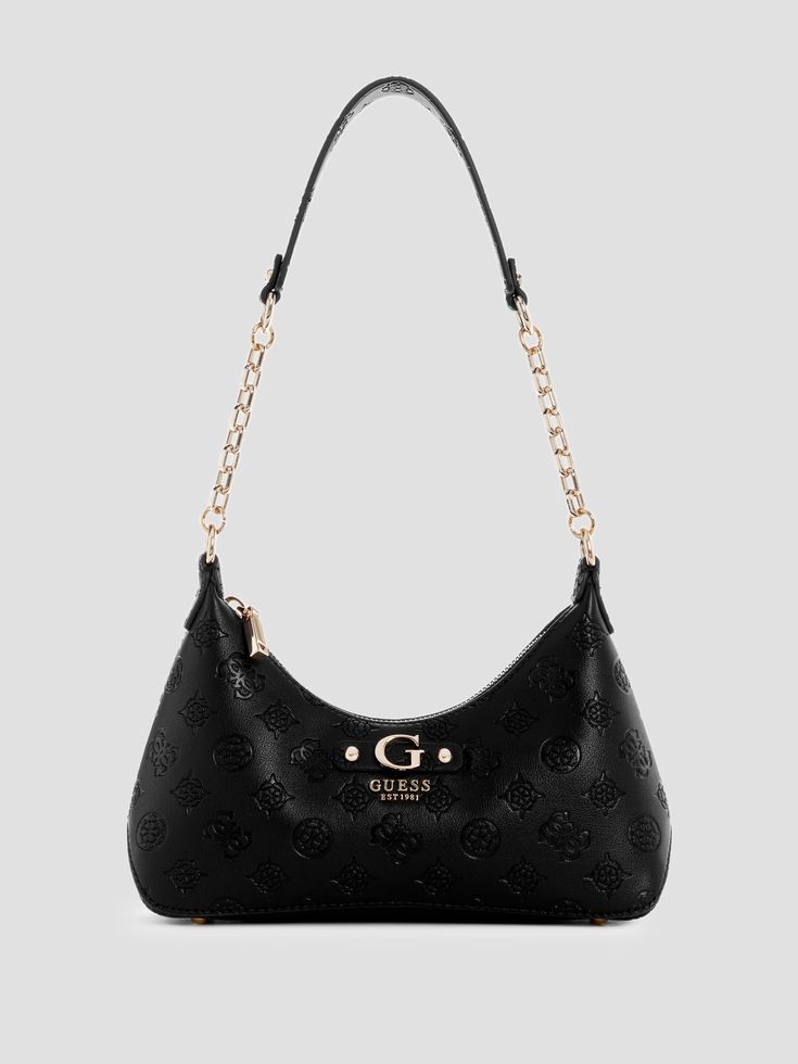 Faux-leather top-zip shoulder bag Debossed peony logo print Shiny gold-tone hardware Front logo lettering Multiple interior pockets Logo printed lining Zip-top closure Shoulder strap with 11.75" drop 10.25"W x 6.75"H x 2.5"D Peony Logo, Y2k Guess Bag, Black Handheld Shoulder Bag With Gold-tone Hardware, Guess Shoulder Bag Black, Bag Guess, Guess Shoulder Bag, Guess Shoulder Bag Sofybrands, Faux Leather Top, Guess Bags