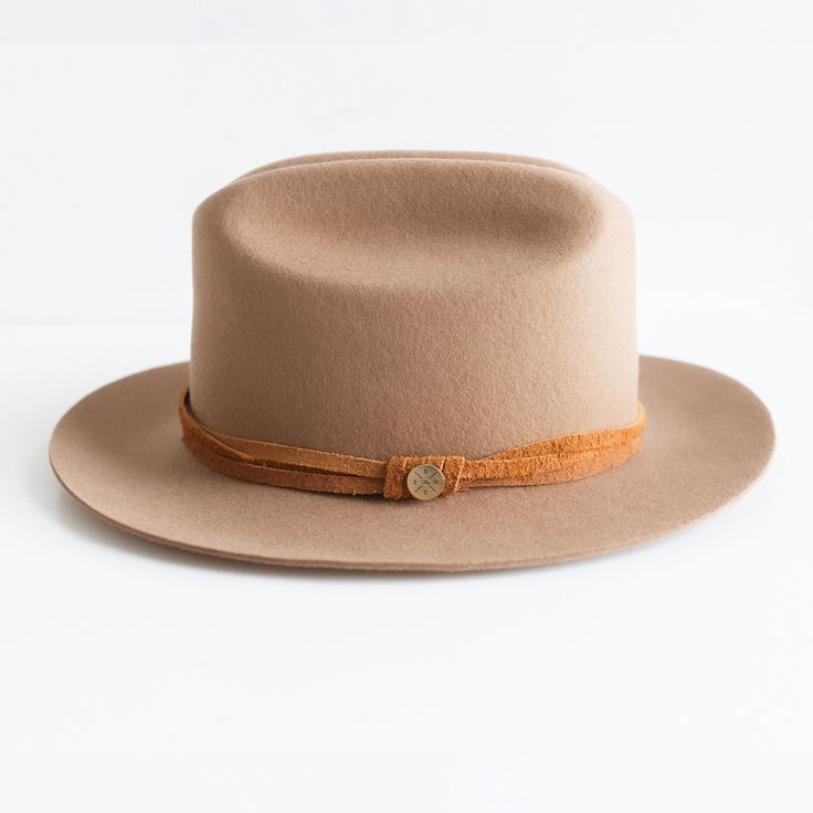 DESCRIPTION The Elliston is made of 100% genuine wool felt, crafted almost entirely by hand to ensure that it sticks around for years to come. It features a wrapped cowhide band. HAT SIZE CHART Side note: This hat fits slightly big. If you're in between sizes, would recommend sizing down. All sizes are measured in centimeters circumference. 55 57 59 61 63 Size S M L XL XXL Inches 21 1/2" 22 1/4" 23 23 7/8" 24 5/8" Fitted Size 6 7/8 7 1/4 7 1/2 7 5/8 7 7/8 Adjustable Brown Wool Fedora, Adjustable Wool Fedora With Flat Crown, Brown Felt Hat Band For Country Events, Brown Fur Felt Fedora Hat, Adjustable Brown Fur Felt Fedora, Adjustable Beige Fur Felt Fedora, Brown Leather Fedora For Winter, Western Brown Felt Hat Bands, Flat Brim Felt Hat For Ranch