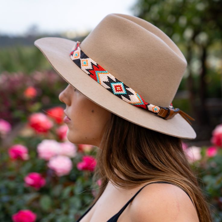 Price includes a Lola Sambboho hat & a Phoenix hatband. Save 10% with this bundle. Select hat size. Hatband is one size fits all. Hatband is removable. An iconic must-have Fedora hat that will never get out of fashion. Sambboho's Lola hat has a soft brim and indented crown. A chic piece to be worn at all seasons of the year. The timelessness chic and sophistication exuded by this hat make it a lifetime wardrobe investment you’ll never regret! Classic Fedora design in Sand color Trimmed with Beaded Hat Brim Patterns, Beaded Hats, Beaded Belts, Beaded Ideas, Beading Designs, Navajo Pattern, Beaded Hat Bands, Beaded Dog Collar, Hat Bands