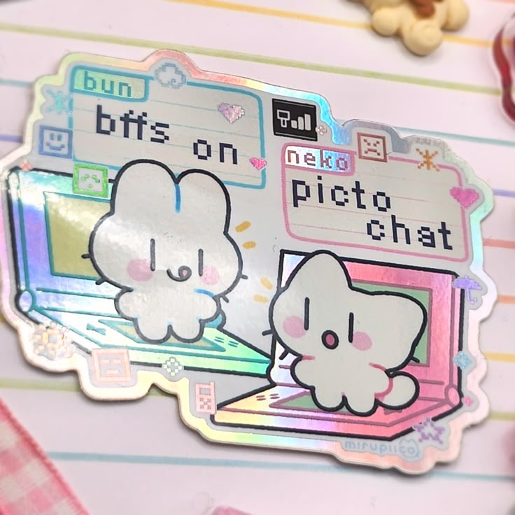 a sticker with an image of two cats on a computer screen and the words hello kitty on it