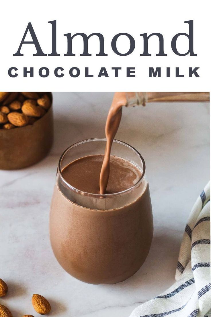 almond milk being poured into a glass with chocolate in it and the words almond chocolate milk