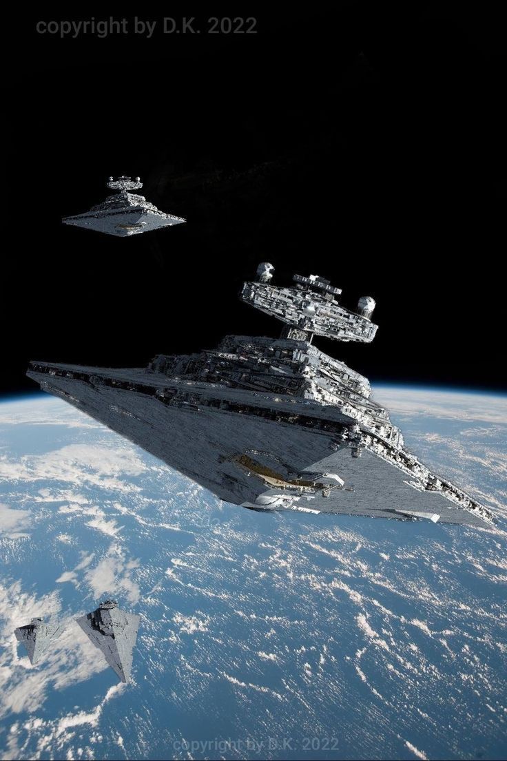 two star wars ships flying over the earth