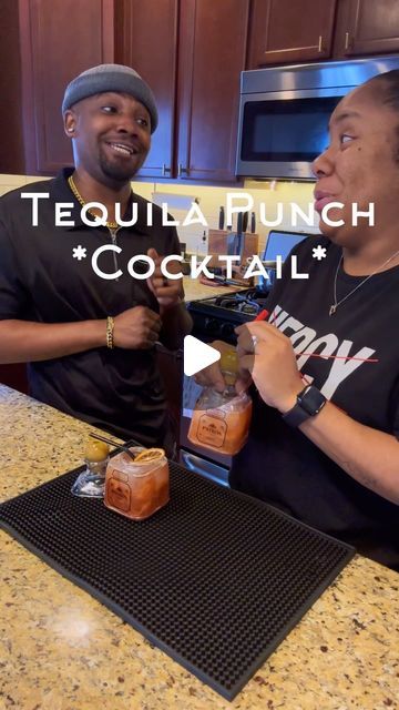 two men sitting at a kitchen counter with bottles in front of them and the caption tequila lunch cocktail