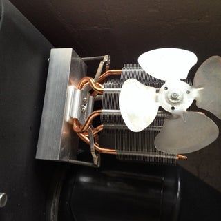 a fan that is sitting on top of a heater