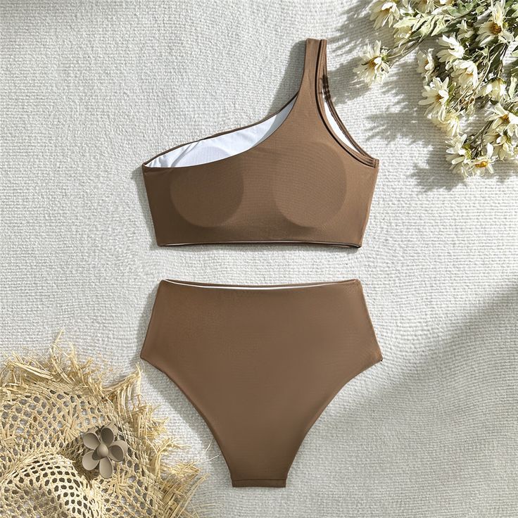 Features: Introducing our New Wrinkled One Shoulder High Waist Bikini! This sleek swimsuit features a unique design that flatters your figure while providing maximum comfort and support. Made for the modern woman, this two-piece set is perfect for any beach or pool day. Say goodbye to traditional swimsuits and hello to style and functionality with our Female Swimsuit! Beige Lined Swimwear For Beach Season, Beige Lined Swimwear, Fitted Beige Swimwear For Sunbathing, Fitted Beige Lined Swimwear, Beige One-piece Swimwear For Pool, Beige Stretch Swimwear For Beach, Beachwear Stretch Swimwear In Beige, Beige Lined Swimwear For The Beach, Beachwear Seamless Beige Swimwear