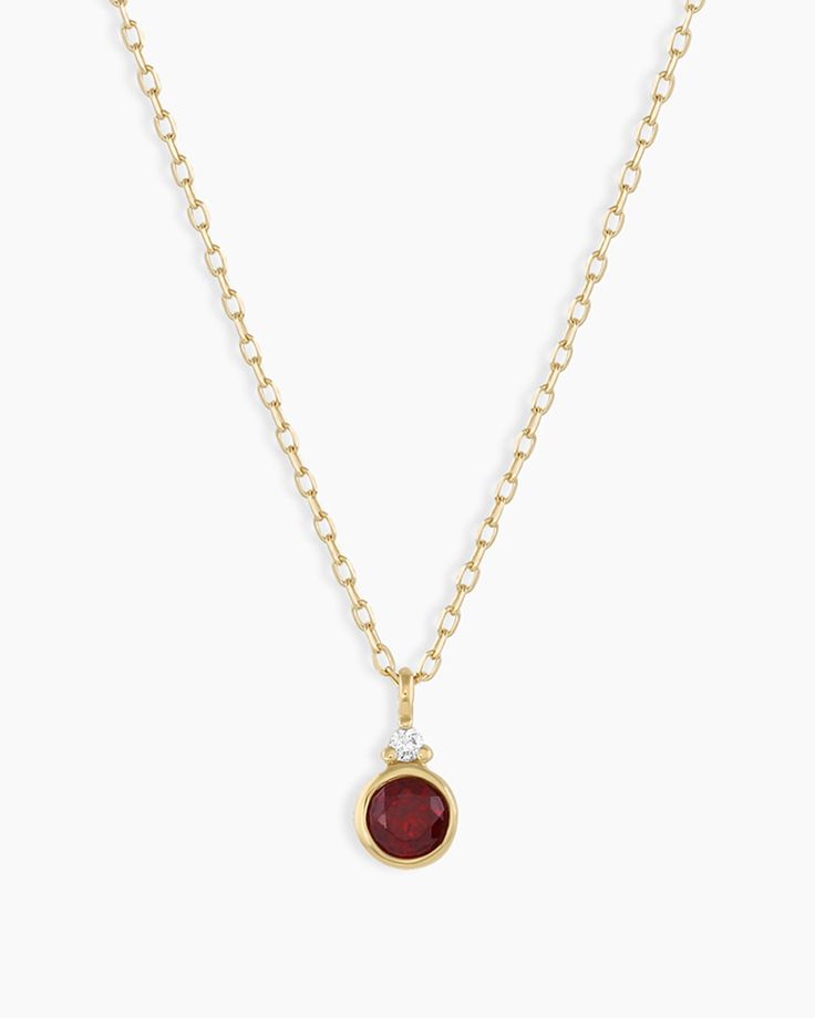 A modern heirloom. Introducing our take on a traditional style. Whether you wear yours or a loved one’s, a birthstone necklace is an easy way to add color and meaning to your look. This birthstone necklace features a 14k gold chain and diamond detail and makes for a perfect, personal gift. Garnet is January's birthstone. Product Details Diamond: 0.01 total carat weight, 1.3 mm GH SI1-SI3 Garnet: 0.15 total carat weight, 3 mm genuine garnet 14k solid gold 16" chain + 2" extender. Adjustable in 1" Gold Birthstone Necklace, Gorjana Jewelry, Garnet Birthstone, Garnet Red, Solid Gold Chains, 14k Gold Necklace, Pretty Rings, Gold Chain Necklace, Birthstone Necklace