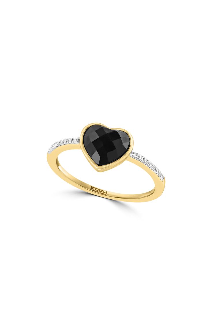 A black onyx heart centers a romantic 14-karat yellow-gold ring finished with a diamond-embellished band for dainty sparkle. 1/4" band width Total onyx weight: 0.85ct. Total diamond weight: 0.06ct. Color: H–I Clarity: I2 14k gold/onyx/diamond Made in the USA Diamond Guide Black Diamond Heart-shaped Jewelry, Black Heart-shaped Diamond Jewelry, Black Diamond Jewelry For Valentine's Day, Valentine's Day Black Diamond Jewelry, Black Ring For Valentine's Day Formal Occasion, Black Rings For Valentine's Day Formal Occasion, Black Rings For Valentine's Day Formal Events, Elegant Black Heart Cut Rings, Elegant Black Rings For Valentine's Day