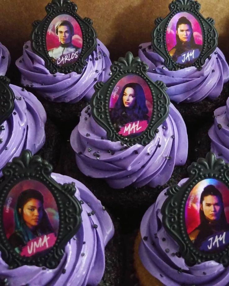 cupcakes with purple frosting and pictures of the same person on each one