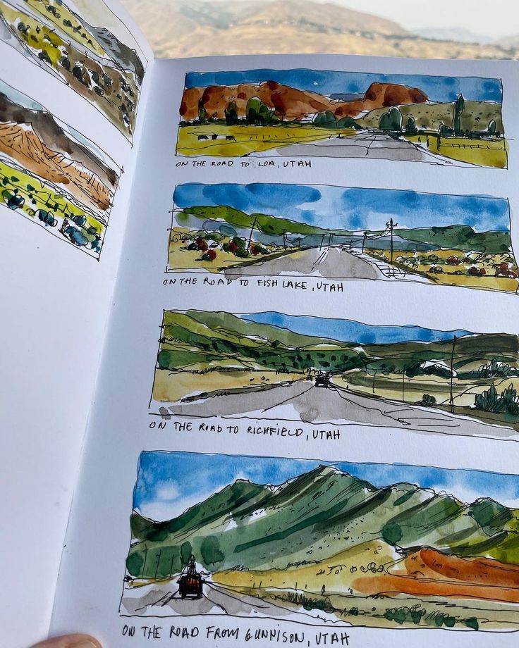 an open book with pictures of mountains and roads