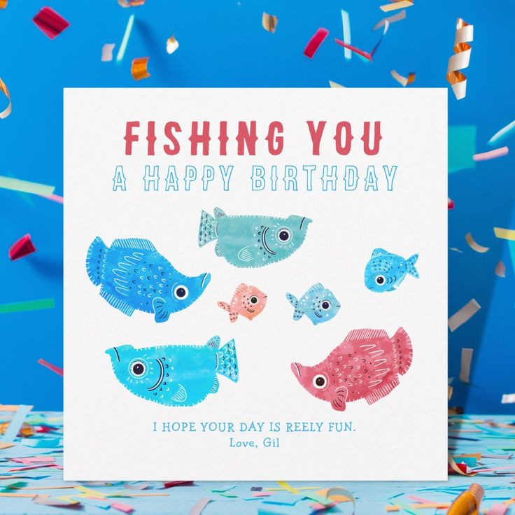 a birthday card with fish on it and confetti