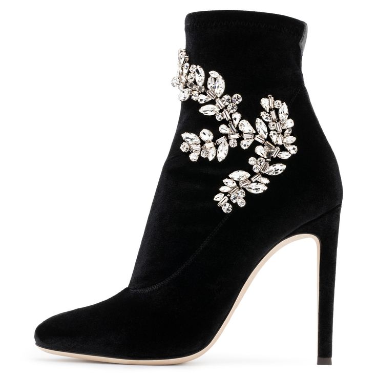 Step into luxury and elegance with the Black Velvet Boots Rhinestone Embellished Stiletto Heel Booties. These eye-catching booties feature sparkling rhinestone embellishments on their luxurious black velvet exterior, creating a glamorous statement piece. The stiletto heel adds a touch of femininity and accentuates your legs, while the versatile design complements various outfits. Enjoy both style and comfort with these booties, crafted with attention to fit and support. Embrace sophistication and charm with these Black Velvet Booties, a must-have addition to your footwear collection. Handcrafted US sizing. Fits true to size. Heel Height: 4.72" / 120 mm approx Product measurements were taken using size 8. Please note that measurements may vary by size. Eye-Catching Rhinestone Embellishments Country Music Outfit, Boots For Work, Black Velvet Boots, Pencil Heels, Velvet Ankle Boots, Luxury Boots, Womens Black Booties, Work Formal, Custom Boots