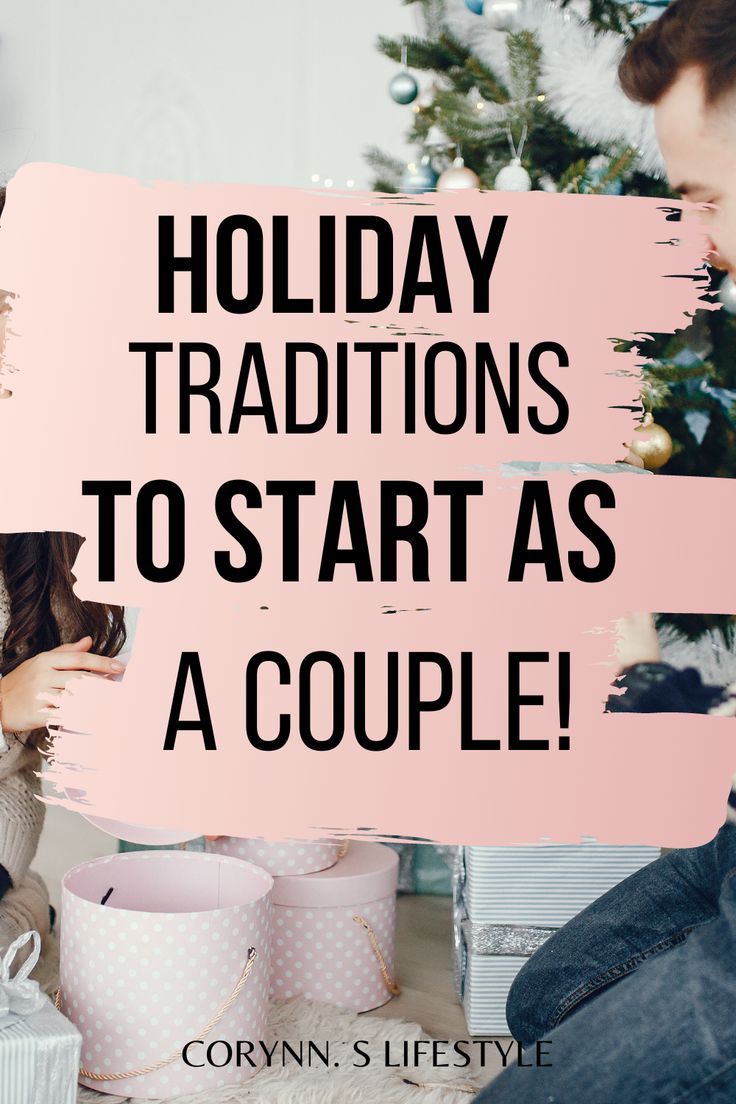 a man and woman sitting in front of a christmas tree with the words holiday traditions to start as a couple