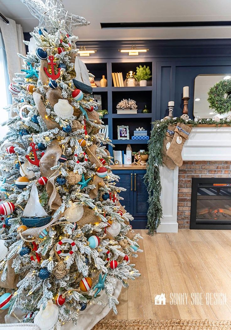 Flocked Nautical Christmas Tree Ideas | Flocked Trees with a Coastal Theme Lake Theme Christmas Tree, Nautical Christmas Tree Ideas, Ocean Christmas Tree, Lake House Christmas Tree, Enchanted Living Room, Surf Christmas Tree, Christmas Tree Ideas Flocked, Ocean Themed Christmas Tree, Lake Christmas Tree