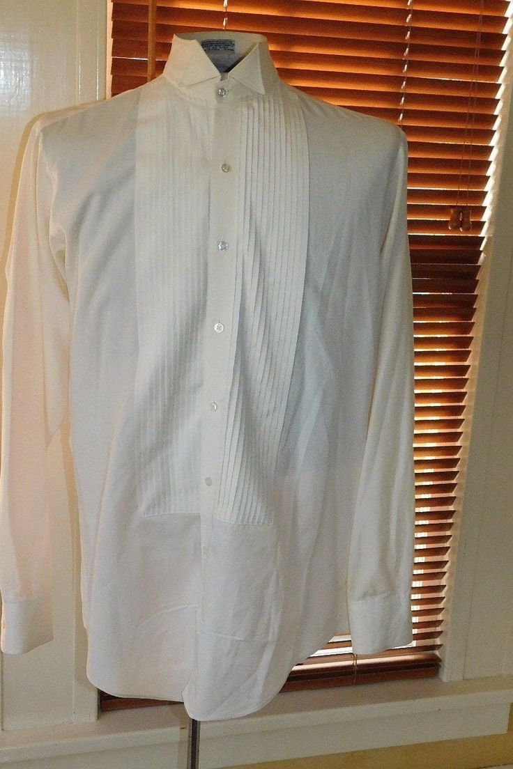 Label: Georgio Patrino Likely 90's or newer cotton/poly formal shirt with wing tip collar and small wale bib - shirt has convertible bib buttons and cuffs (you can use cufflinks and shirts studs or just use the buttons) Size    Neck: 15 / Chest: 42-44 / Sleeve: 24" / Across Shoulder Seams: 17" Condition:  Excellent  AMERICAN VINTAGE CLASSICS RST044 Formal Collared Dress Shirt For Summer, Summer Formal Collared Dress Shirt, Formal Summer Tops With Collar, Formal Tuxedo Dress Shirt With Long Sleeves, Elegant Cotton Dress Shirt For Formal Occasions, Fitted Dress Shirt For Formal Summer Occasions, Fitted Dress Shirt For Summer Formal Events, Classic Formal Tops For Summer, Fitted Formal Summer Dress Shirt