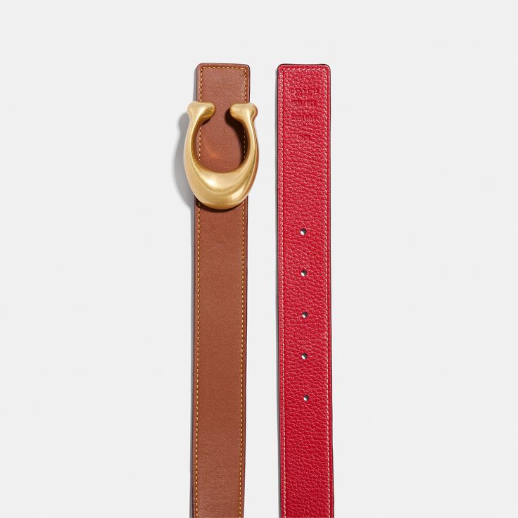 This belt is crafted from smooth glovetanned leather and reverses to textured pebble leather for two looks in one. It's finished with our C hardware for heritage style. | Coach C Hardware Reversible Belt, 32 Mm - Women's - 1941 Saddle/1941 Red/brass Style Coach, Reversible Belt, Heritage Fashion, Pebbled Leather, Saddle, Brass, Leather, Red, Black