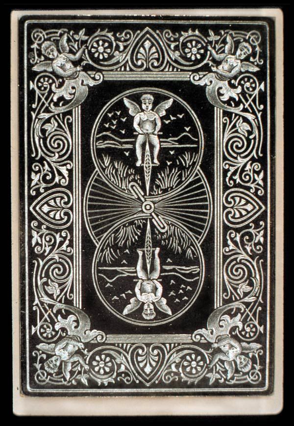 an antique playing card with the image of a man holding a cross and two angels on it