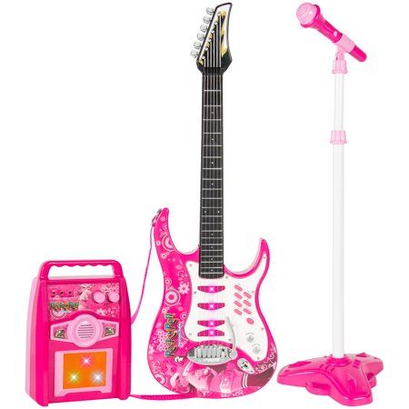 a pink guitar and microphone are on display