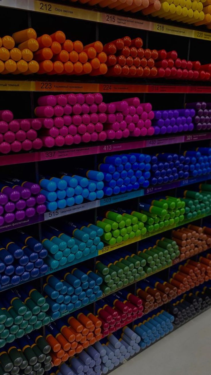 there are many different colors of beads on display