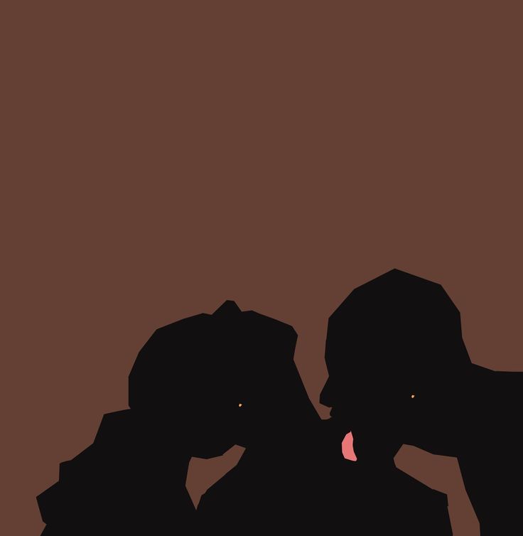 two people standing next to each other in silhouette