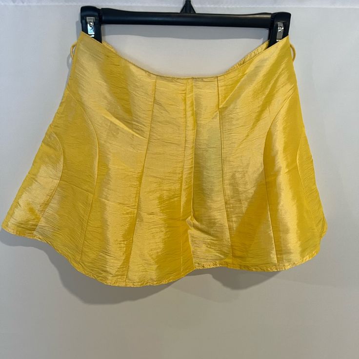 Both Skirts Are A Size Small. Yellow Skirt Has A Small Mark That May Just Be A Wrinkle (I’m Not Sure). Black Skirt Has No Imperfections. Black Skirt Is New But Didn’t Come With A Tag. All Offers Welcomed. Spring Party Short Pleated Skirt, Yellow Pleated Party Bottoms, Skirted Shorts For Spring Party, Spring Party Pleated Shorts, Yellow Flared Party Skirt, Yellow Short Skort For Spring, Yellow Flowy Skirt For Party, Stretch Yellow Mini Skirt, Stretch Yellow Mini Skirt With Lining