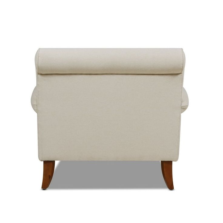 a white chair with wooden legs on a white background