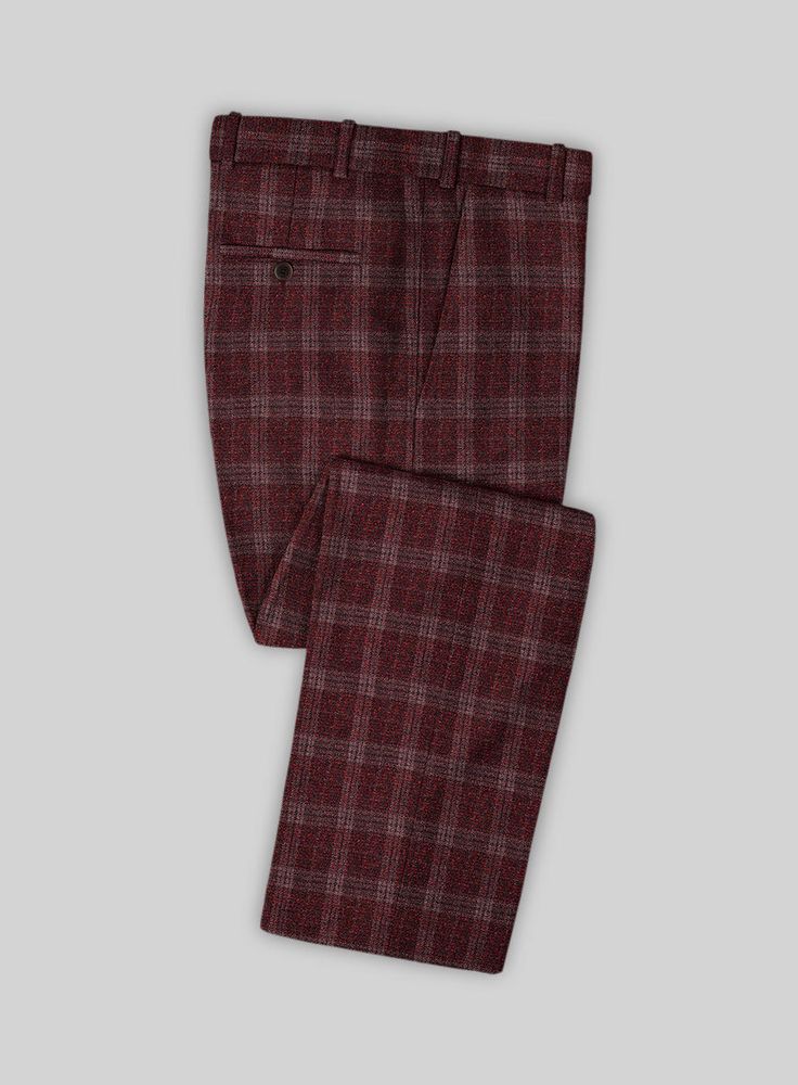 Intertwine your work and luxury wear with our Italian Austor Checks Tweed Suit that has a polished and modern attribute. Crafted with a wool blend, this elegant piece has a plaid pattern in a dark and robust red shade that are the hallmarks of perfection. Meanwhile, this custom-made piece offers comfort and hugs your well-maintained physique. So grab this piece to gain superiority amongst everyone, and it lets you be a brand. 
 
 Look features a 2 button jacket with notch lapels, h orn royal bla Luxury Tweed Notch Lapel Suits, Tweed Pants, Tweed Suit, Luxury Wear, Tweed Suits, Button Jacket, Jacket Buttons, Black Button, Plaid Pattern