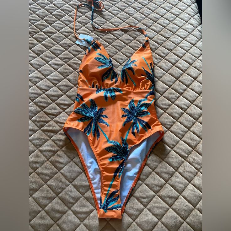 Super Cute One Piece Swimsuit New With Tags String Halter You Can Tie Several Different Ways Removable Light Pads *See Photos Has Small Snag On Right Top Orange Lined Swimwear For Vacation, Orange V-neck Swimwear For The Pool, Orange V-neck Swimwear For Pool, Orange V-neck Swimwear For Vacation, Orange Tropical Print Swimwear For Swimming, Orange Tropical Print Swimwear For Pool, Fitted Orange Tropical Print Swimwear, Orange Fitted V-neck Swimwear, Fitted Orange V-neck Swimwear