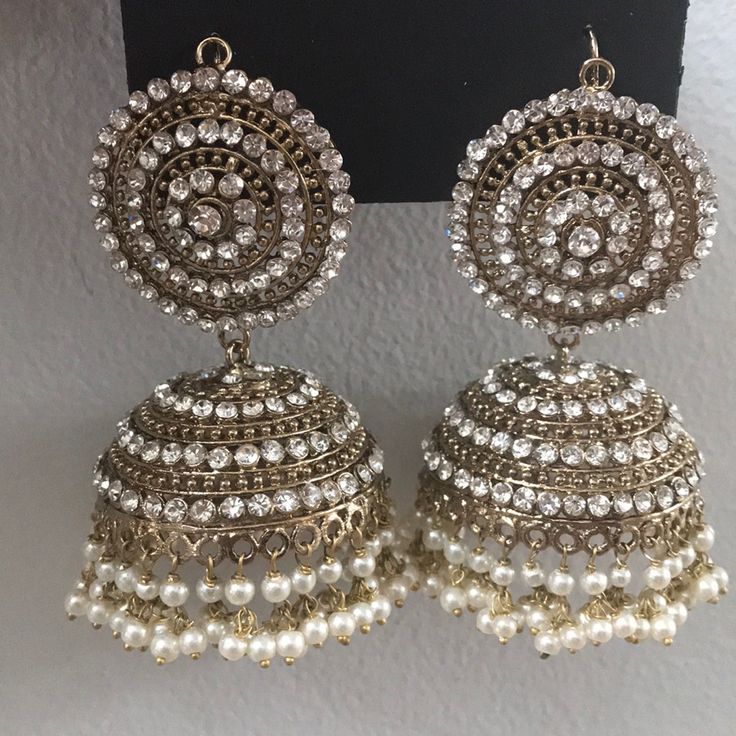 Brand New Never Worn Luxury Gold Jhumkas With Pearl Drop, Luxury Bollywood Pearl Earrings For Diwali, Luxury Bollywood Jhumkas With Pearl Drop, Luxury Bollywood Chandbalis With Pearl Drop, White Bohemian Earrings For Diwali, Bohemian White Earrings For Diwali, Bollywood Style White Jhumkas, White Round Jhumkas For Diwali, White Jhumkas For Diwali