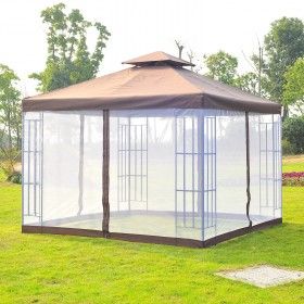 a gazebo in the middle of a grassy area with trees and bushes behind it