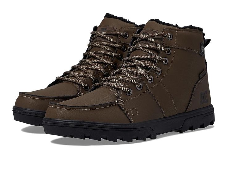 DC Woodland - Men's Boots : Dark Chocolate : Now you can look forward to the drop in temperature with the DC Woodland boot! Rugged outdoor boot silhouette. Suede upper material. High-top style with a round moc toe. Lace-up closure with long-lasting metal eyelets provide a secure and snug fit. Padded collar and tongue for added comfort. Heel pull provides an easy entry. Textile lining for breathability and a cushioned insole. Durable rubber lug outsole for added traction and rugged wear. Imported Winter Hiking Lace-up Moto Boots, Winter Hiking Moto Lace-up Boots, Casual Insulated Mid-top Boots, Winter High-top Combat Boots With Protective Metal Feet, Winter Moto Boots With Rubber Sole For Outdoor Activities, High-top Combat Boots With Lacing For Outdoor, Casual High-top Boots With Protective Metal Feet, Rugged Winter Boots With Lacing, Rugged Lacing Winter Boots