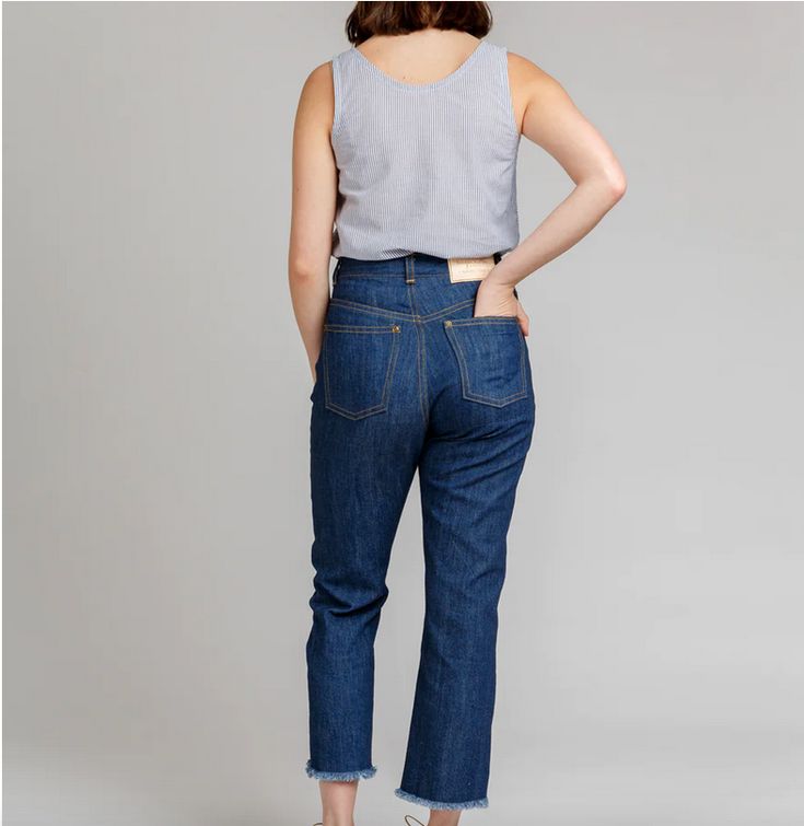 Classic high-waisted rigid jean pattern set. Includes four cuts and multiple lengths for tall, regular, and cropped. Pattern features a high rise to sit on the natural waist, button fly, close fit through the waist and hips, and classic jeans details. Cropped Rigid Denim Jeans With Belt Loops, Rigid Denim Cropped Jeans With Belt Loops, Cropped Dark Wash Jeans For Fall, Fall Cropped Dark Wash Jeans, Cropped Denim Pants With Frayed Hem, Mid-rise Cropped Jeans With Frayed Hem In Rigid Denim, Straight Leg Cropped Jeans In Recycled Denim, Relaxed Fit Cropped Jeans With Belt Loops, Everyday High Waist Cropped Jeans With Frayed Hem