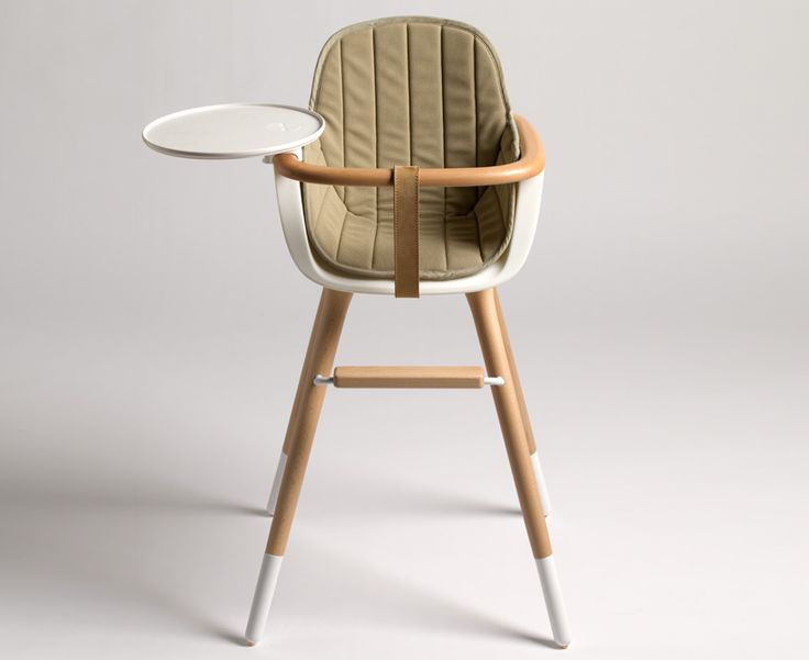 a chair with a tray attached to the back of it's seat and legs