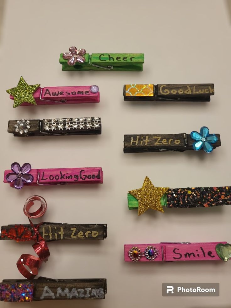 there are many different types of hair clips on the wall, including one for girls and one for boys