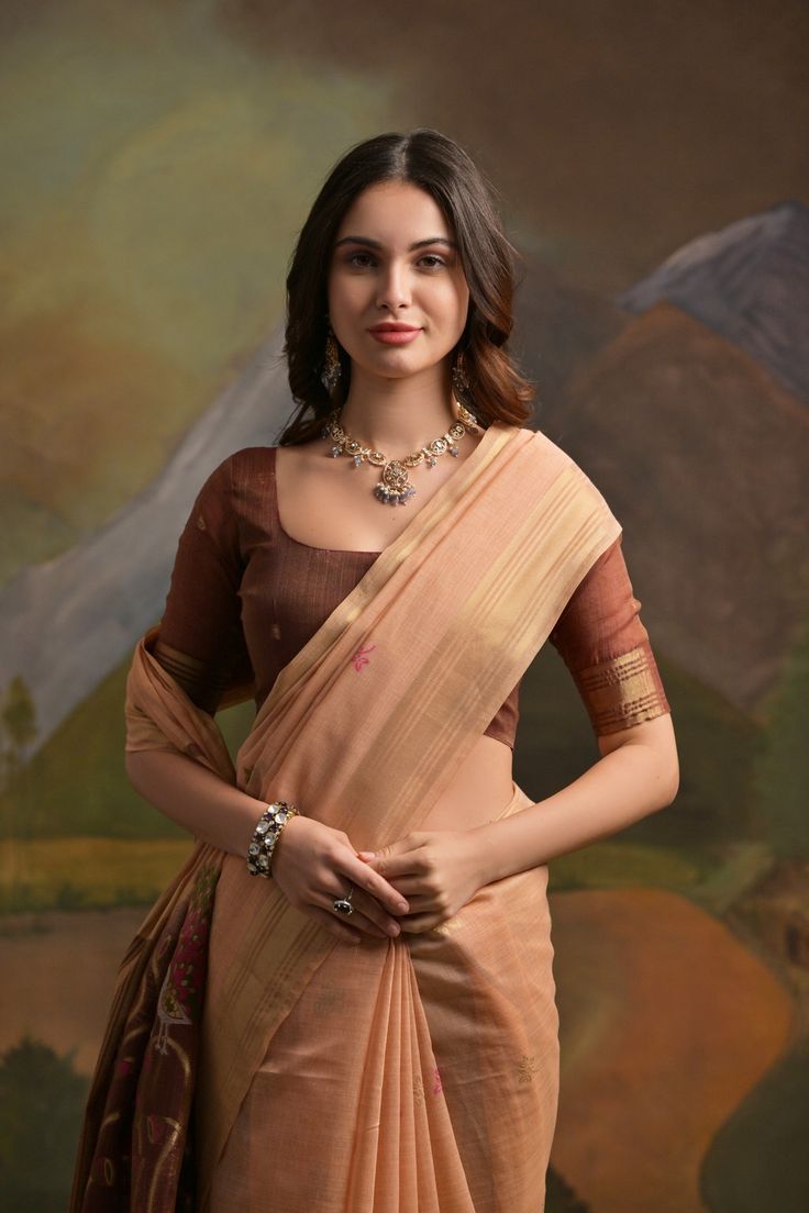 Saree Fabric : Pichwai Weaves Muga Cotton Saree Saree Color : Crayola Peach Saree Length : 5.5 Meter Blouse Length : 0.8 Meter Saree Work : Thread Woven Wash : Dry Clean Product color may little differ as per the brightness or color settings of your device Traditional Peach Pre-draped Saree With Zari Work, Traditional Peach Pre-draped Saree For Festive Occasions, Cotton Silk Pre-draped Saree For Puja With Zari Weaving, Designer Handloom Paithani Silk Pre-draped Saree, Orange Slub Silk Traditional Wear, Peach Traditional Wear With Dupatta For Navratri, Slub Silk Choli With Pallu, Orange Slub Silk Traditional Wear For Wedding, Peach Raw Silk Traditional Wear With Zari Work