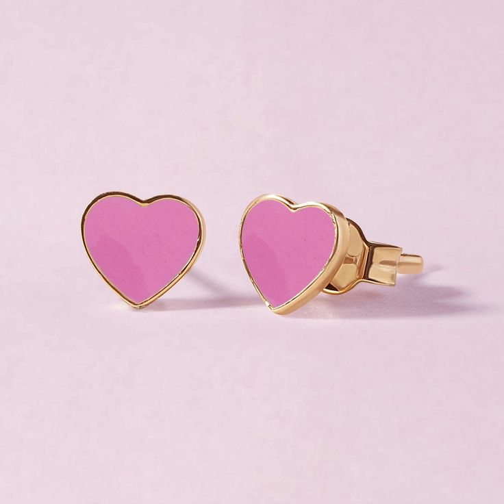 A soft enamel heart on a delicate gold stud, a love story to your stack. Double Heart Enamel Jewelry For Gifts, Gold Enamel Heart Earrings, Gold Enamel Heart Charm Earrings, Gold Heart-shaped Enamel Earrings, Gold Enamel Heart-shaped Earrings, Gold Enamel Heart Earrings For Valentine's Day, Yellow Gold Enamel Heart Charm Jewelry, Valentine's Day Gold Heart Enamel Earrings, Pink Gold Heart Earrings For Gift