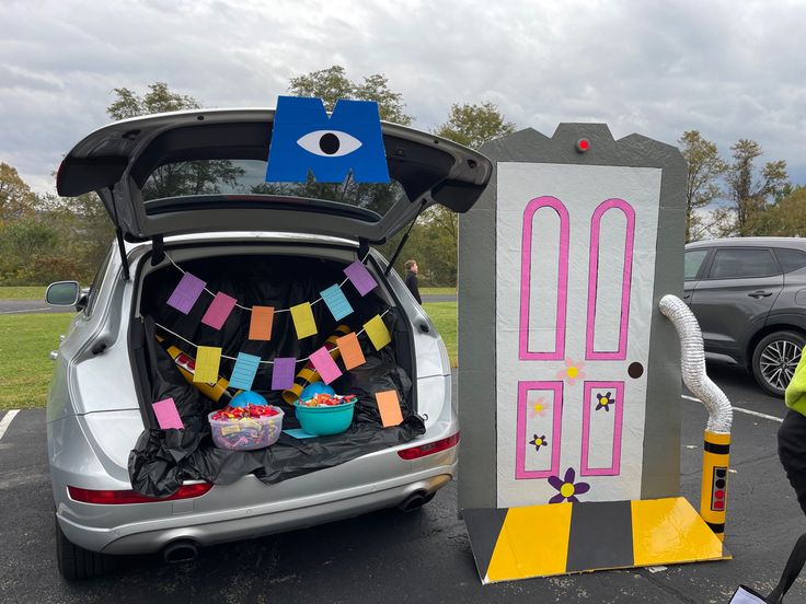 the trunk of a car is decorated with decorations